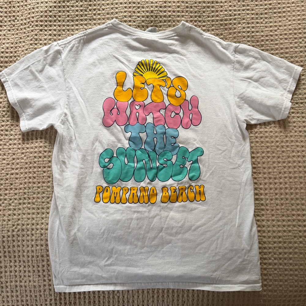 Delta White Tee with Vibrant Sunset Graphic